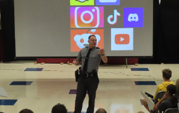 Trooper Rocco Gagliardi leads presentation at Pleasant Hills Middle School