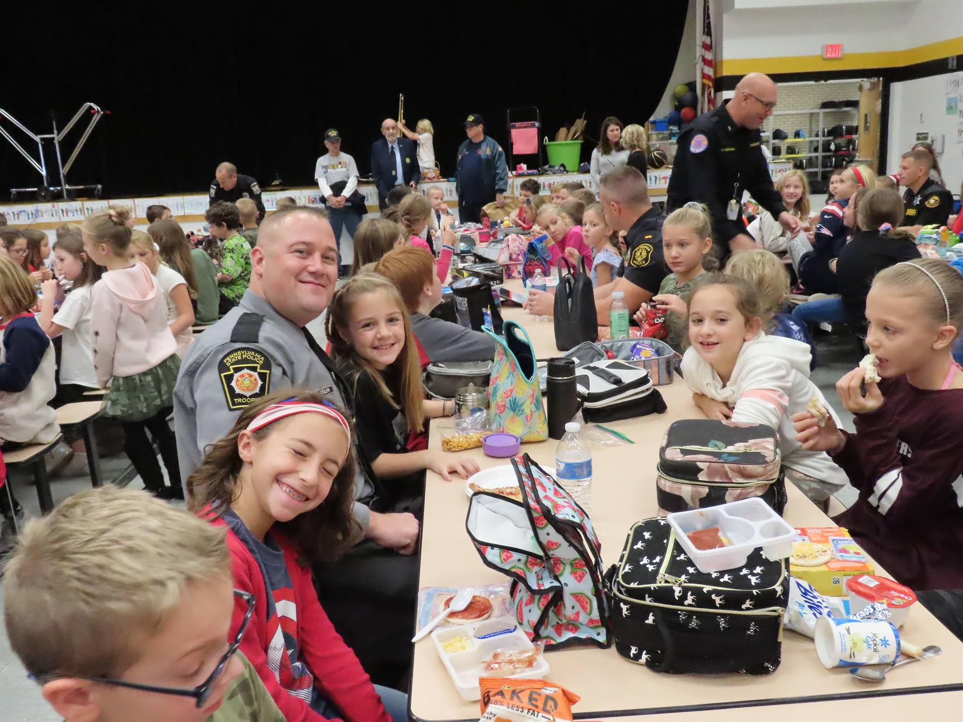 Police officer and lunch table